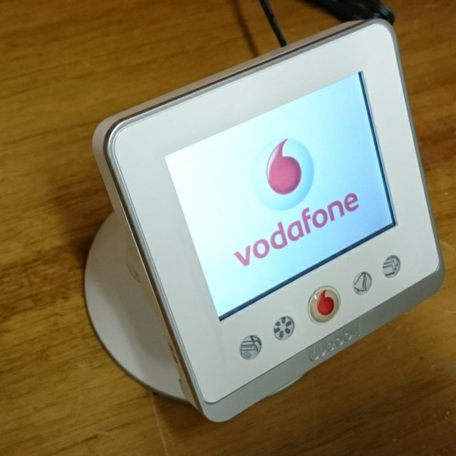 Vodafone logo display device